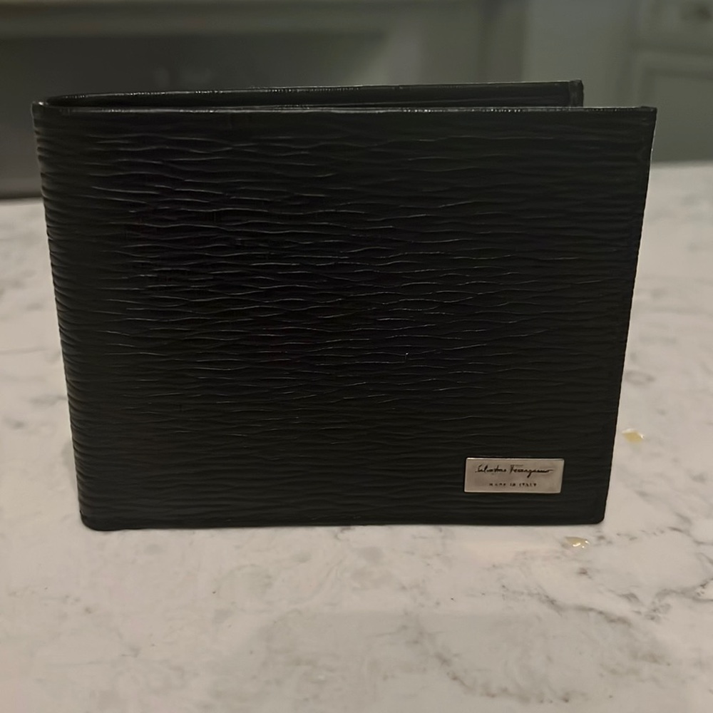 Feragamo wallet never used!  New but no tags 100% authentic black leather